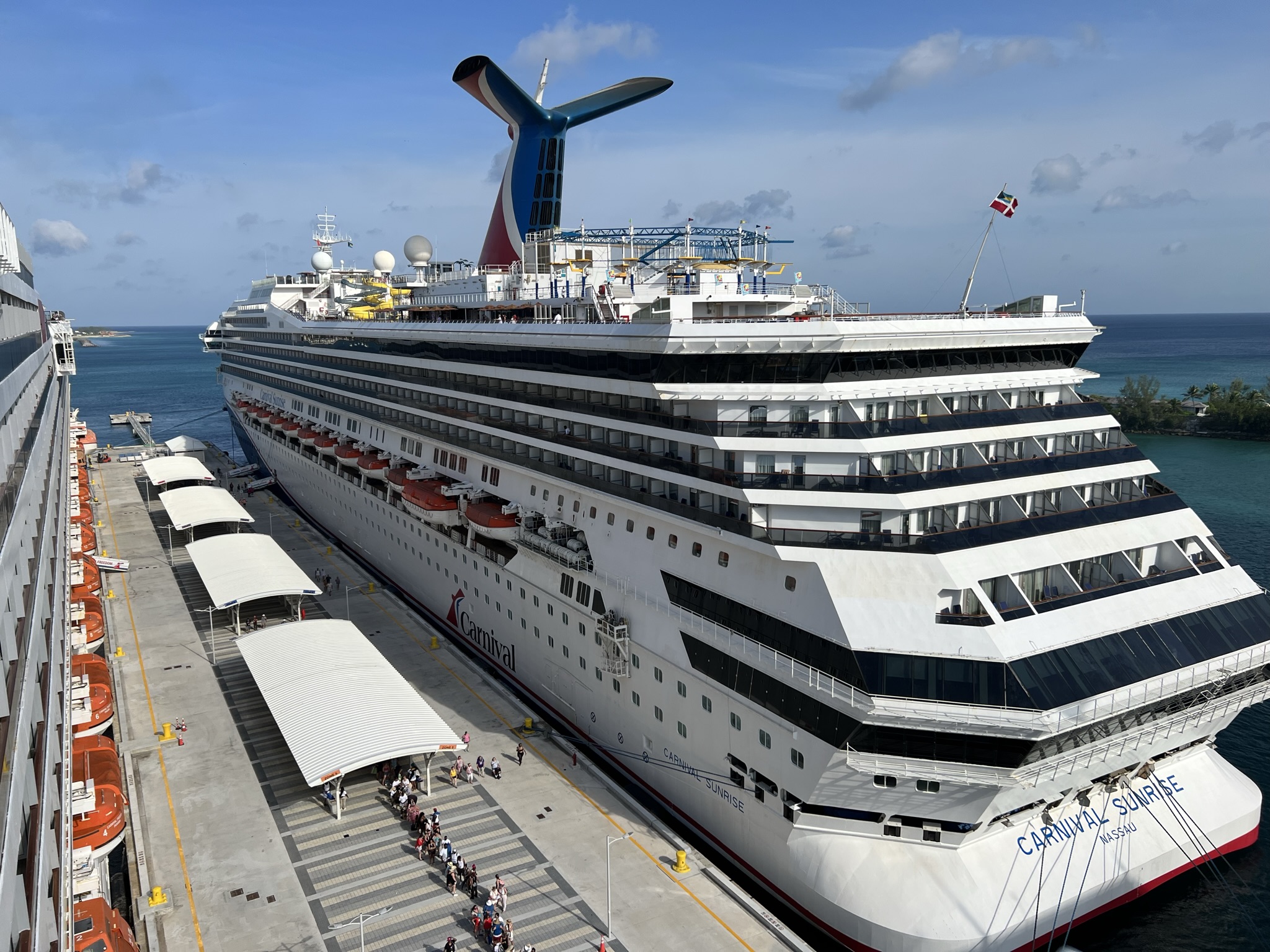 Cruise Ships – Cruise Ship Carnival Sunrise Leaves the Port of Nassau Bahamas and Heads Out to Sea