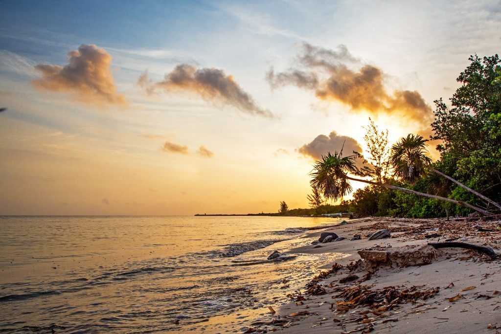 Beautiful golden colorful sunrise over the beach in Cozumel, Mexico